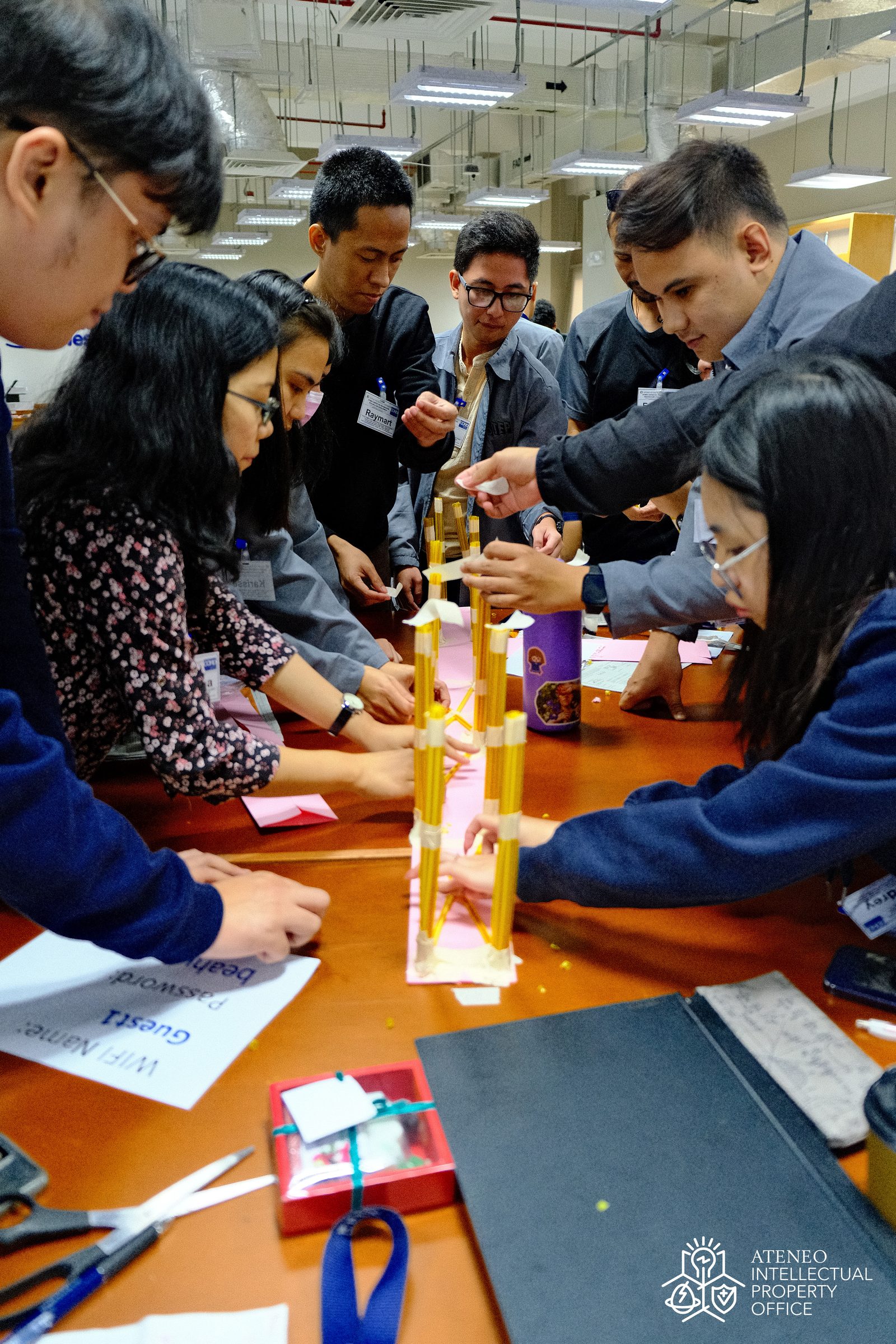 Researchers building a structure together at a STEP team workshop